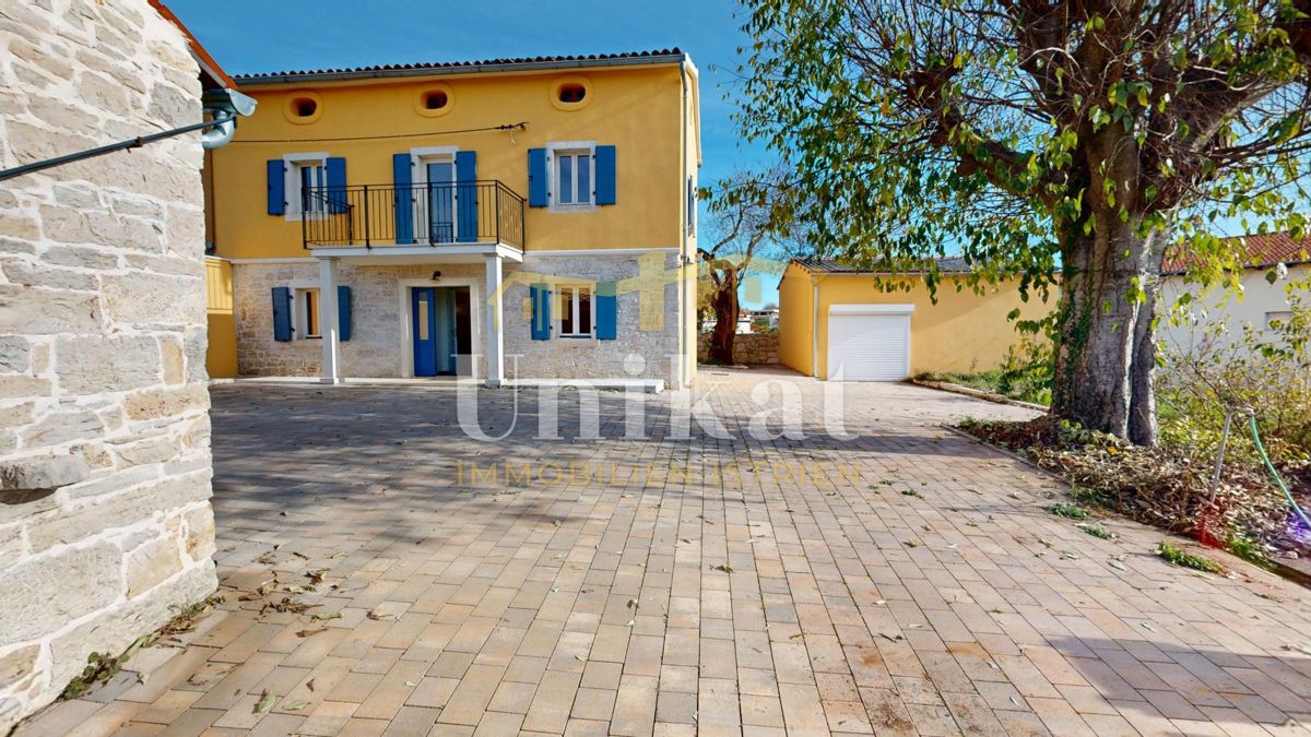 Dvojna kuća con garage e ampio giardino